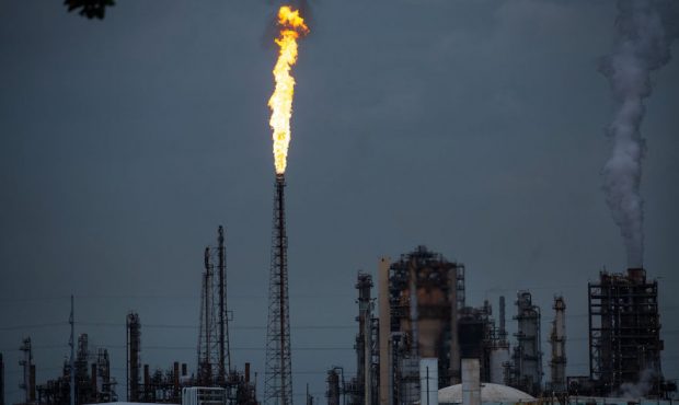 FILE: A gas flare from the Shell Chemical LP petroleum refinery illuminates the sky on August 21, 2...