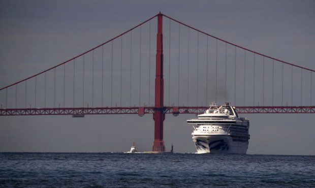 The Princess Cruises Grand Princess cruise ship passes under the Golden Gate Bridge on its way to a...