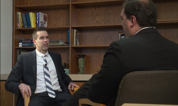 KSL reporter Matt Gephardt talks with IRS special agent Casey Hill....