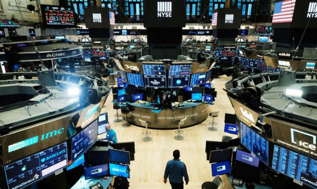 Traders work on the floor of the New York Stock Exchange (NYSE) on March 20, 2020 in New York City....