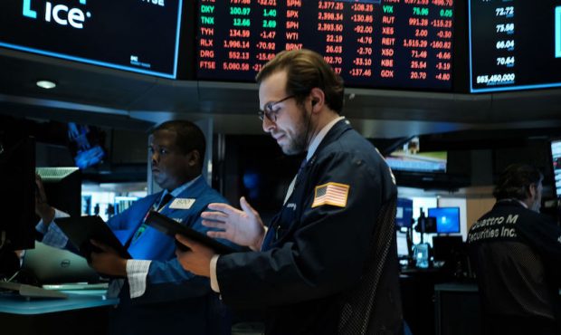 Traders work on the floor of the New York Stock Exchange (NYSE) on March 18, 2020 in New York City....