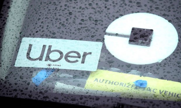 FILE - The Uber logo is displayed on a car on March 22, 2019 in San Francisco, California. Uber Tec...