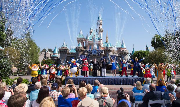 In this handout photo provided by Disney parks, Mickey Mouse and his friends celebrate the 60th ann...