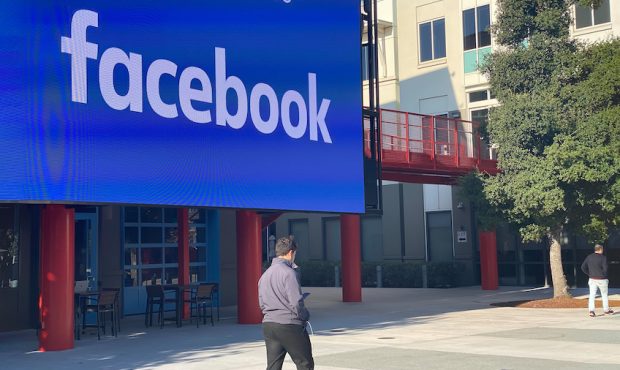 An employee of the Internet company Facebook walks through the courtyard of the company campus in M...