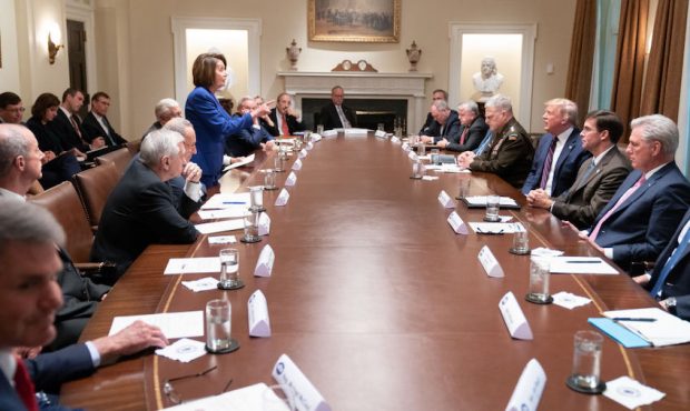 In this handout provided by the White House, U.S. President Donald Trump meets with House Speaker N...