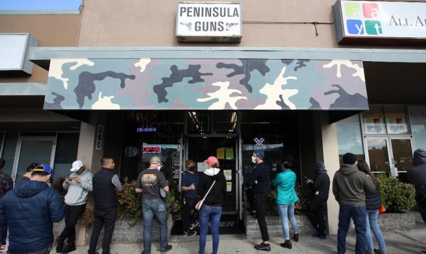 SAN BRUNO, CALIFORNIA - MARCH 16: People wait in line to purchase guns and ammunition at Peninsula ...