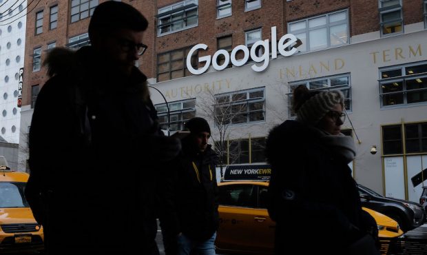 People walk past a Google office building on 9th Avenue in Chelsea district on December 30, 2017 in...