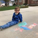 Ira Jones of Sandy finds great joy in the Disney chalk art three senior girls in his neighborhood create for him. (Courtesy Evan Jones)