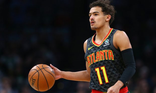 Trae Young #11 of the Atlanta Hawks dribbles against the Boston Celtics during the first quarter at...