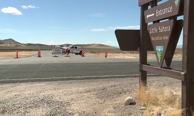 A BLM law enforcement truck sits at the turnoff to Little Sahara Recreation Area, which was closed ...