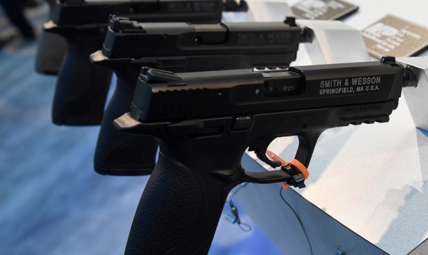 Handguns are displayed at the Smith & Wesson booth at the 2018 National Shooting Sports Foundation'...