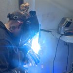 Kylie Hrubes works on her welding skills at SLCC in late February.