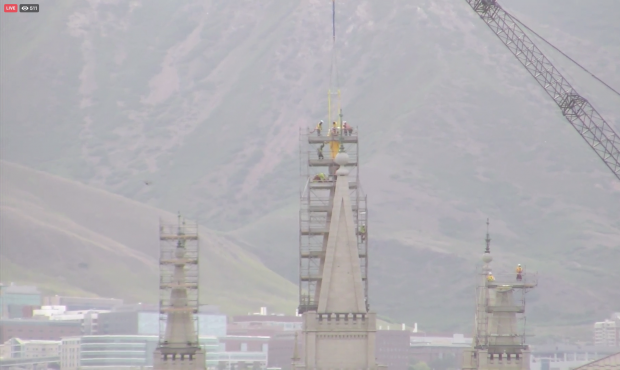 Crews begin process of removing the Angel Moroni statue from the Salt Lake Temple on May 18, 2020....