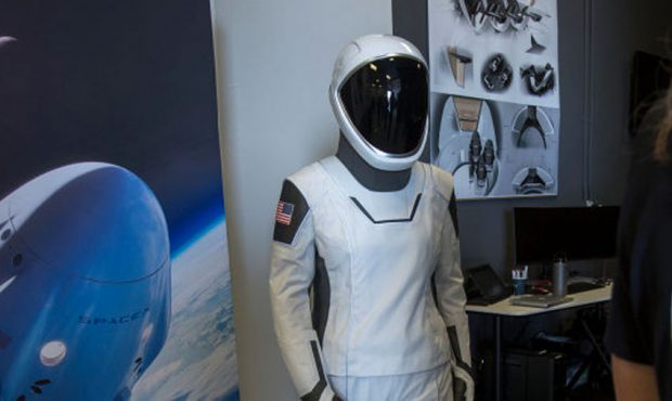 A spacesuit designed for use on the Crew Dragon spacecraft is seen during a media tour of SpaceX he...