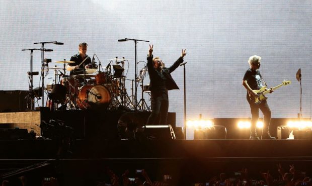 Adam Clayton, Bono and Larry Mullen Jr of U2 perform at the National Stadium on November 30, 2019 i...