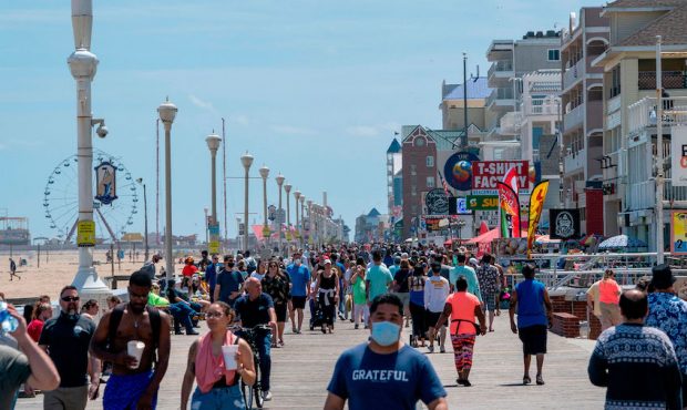People enjoy the boardwalk during the Memorial Day holiday weekend amid the coronavirus pandemic on...