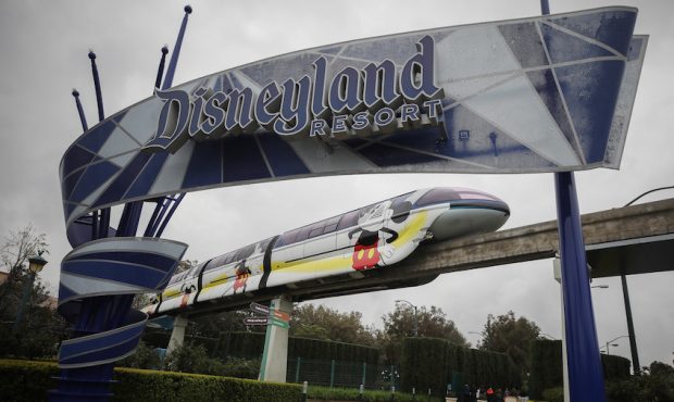 The monorail passes an entrance gate to the famed amusement park Disneyland on March 13, 2020 in An...