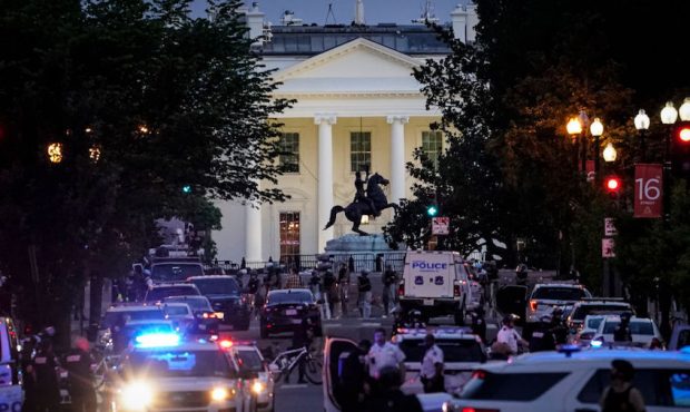 A large law enforcement response is seen near the White House after a protest was dispersed on June...