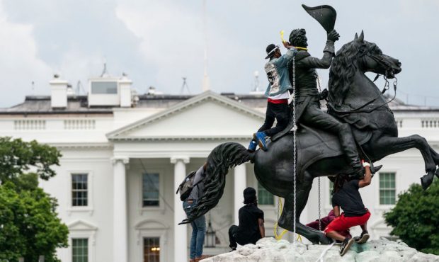 Protesters attempt to pull down the statue of Andrew Jackson in Lafayette Square near the White Hou...