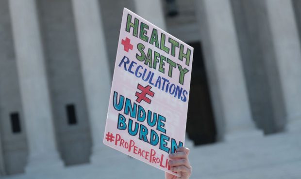 Pro-life activists stage a protest in front of the U.S. Supreme Court June 25, 2020 in Washington, ...