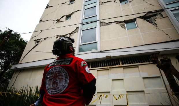 MEXICO CITY, MEXICO - JUNE 23: An urban search and rescue rescuer looks a damage bulding since the ...