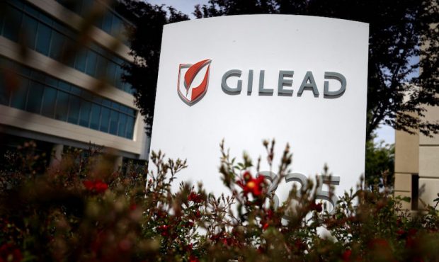 A sign is posted in front of the Gilead Sciences headquarters on April 29, 2020 in Foster City, Cal...