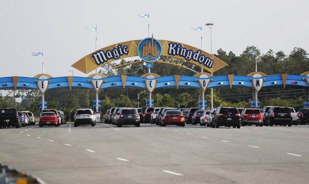 LAKE BUENA VISTA, FL - JULY 11: Drivers pass through the Walt Disney World Magic Kingdom theme park...