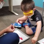 Four-year-old Peter Alfaro is autistic and goes to occupational therapy to work on his sensory skills. After using his coloring book to understand why others were wearing personal protective equipment (PPE), he had a much better experience in therapy.