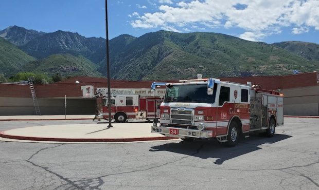 Crews respond to a small fire on the roof of Lone Peak Elementary School in Sandy on July 17, 2020 ...