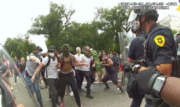 Body camera footage obtained exclusively by KSL TV shows the moment a protester threw a rock at a S...