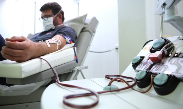 ERLANGEN, GERMANY - APRIL 27: A recovered Covid-19 patient donates blood plasma for research into C...