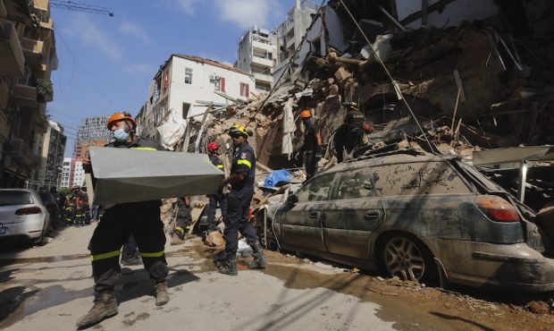 BEIRUT, LEBANON - AUGUST 06: Emergency workers search a collapsed building on August 6, 2020 in Bei...