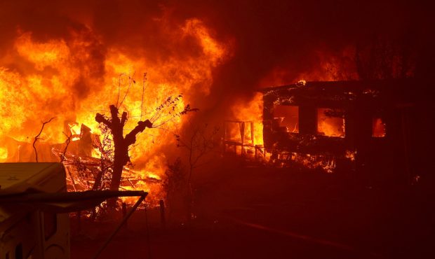 NAPA, CALIFORNIA - AUGUST 18: Mobile homes burn at the Spanish 
Flat Mobile Villa as the LNU Lightn...
