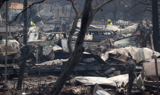 NAPA, CALIFORNIA - AUGUST 24: Utility workers survey the damage a mobile home park that was destroy...