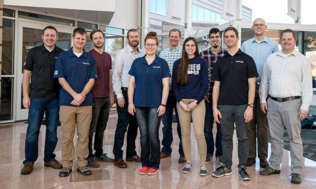 Members of the Space Dynamics Laboratory HARP team pose for this photo on February 19, 2020, at SDL...