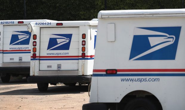 United States Postal Service trucks are parked at a postal facility on August 15, 2019 in Chicago. ...