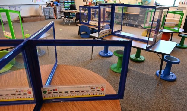 Dividers have been placed on tables at an elementary school in the Jordan School District....
