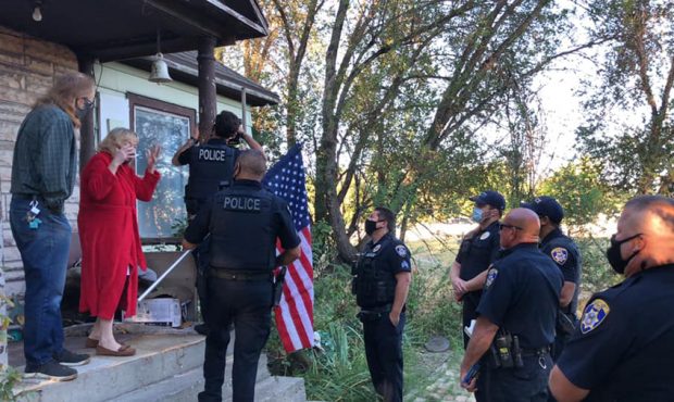 South Salt Lake police present a new flag and pole to attack victim. (South Salt Lake Police Depart...