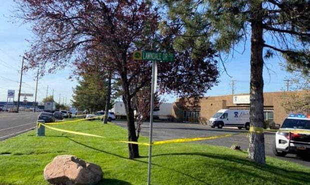Authorities respond after the body of a partially-clothed woman was discovered in South Salt Lake o...