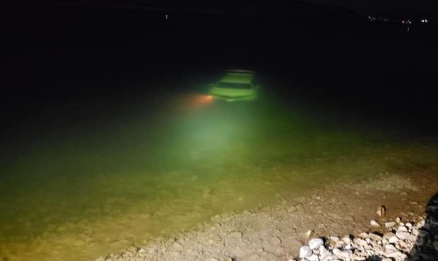 The owner of a car was taking photos of his vehicle at Deer Creek Reservoir when it rolled into the...