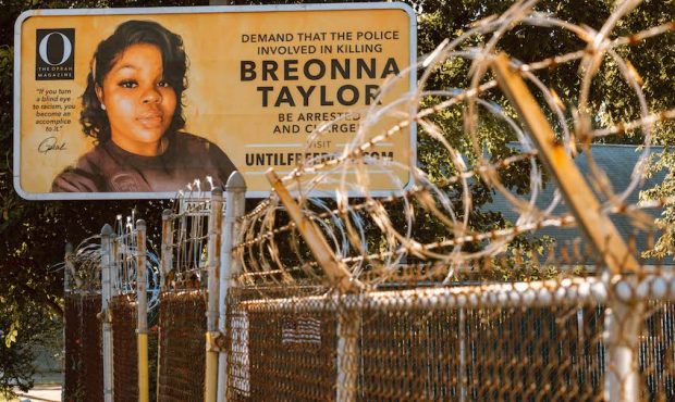 A billboard featuring a picture of Breonna Taylor and calling for the arrest of police officers inv...