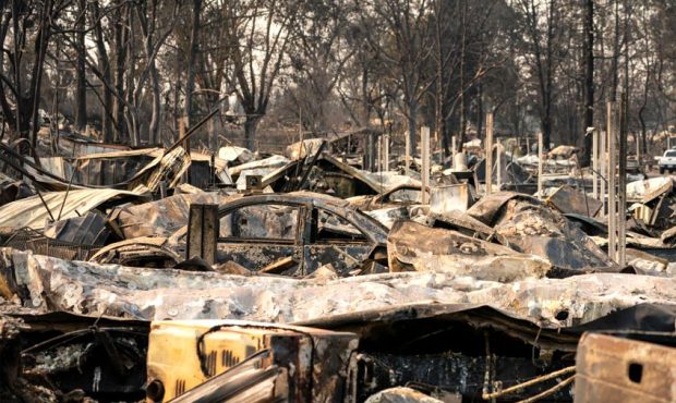 Damaged homes and cars are seen in a mobile home park destroyed by fire on September 10, 2020 in Ph...