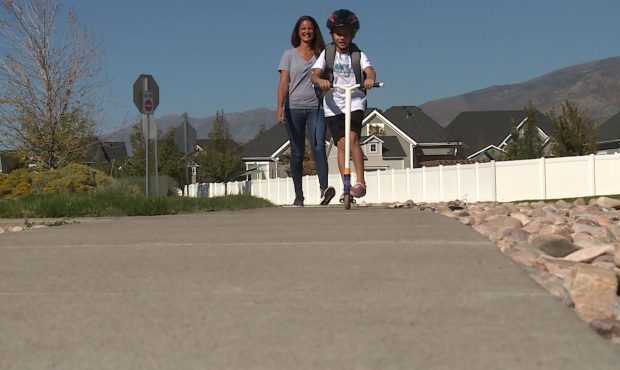 FILE: Jennifer Borland says she enjoys walking with her kids to school because it allows for them t...