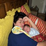 Darcey Brockman sleeps with her newborn baby, Jack Brockman. (Photo Credit: Darcey Brockman)