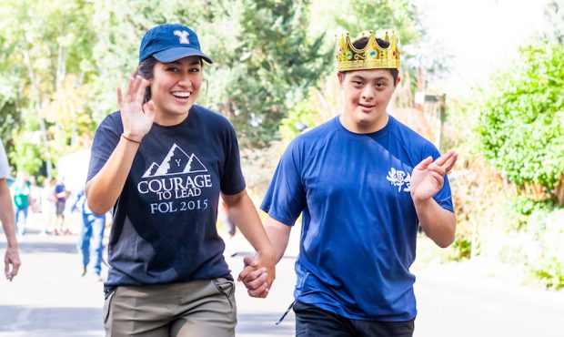 Kai Papenfuss wore his king crown as he walked with his sister, Kyrie, in the neighborhood Disney t...