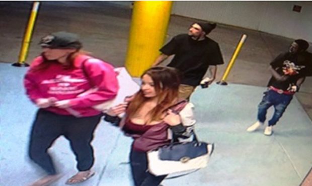 Surveillance photo of one group of credit card suspects entering a parking garage. (Park City Polic...