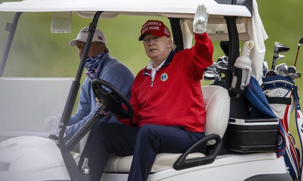 STERLING, VIRGINIA - NOVEMBER 27: US President Donald Trump golfs at Trump National Golf Club on No...