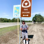 Rex Blackburn poses at the start of the 1300-mile Mormon Pioneer Trail in Nauvoo, Illinois. Rex and Riley Blackburn