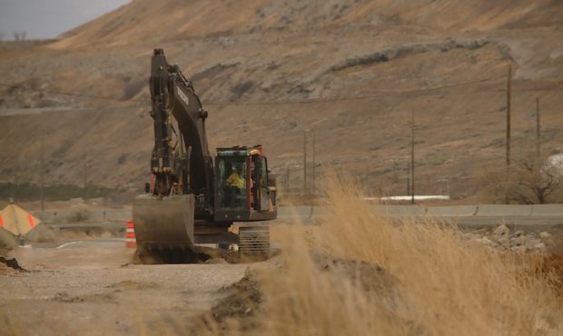Crews repair the road to Great Salt Lake State Park. (Tanner Siegworth/KSL-TV)...