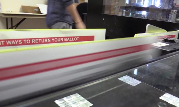 A vote-sorting machine checks signatures. (Matt Gephardt, KSL TV)...